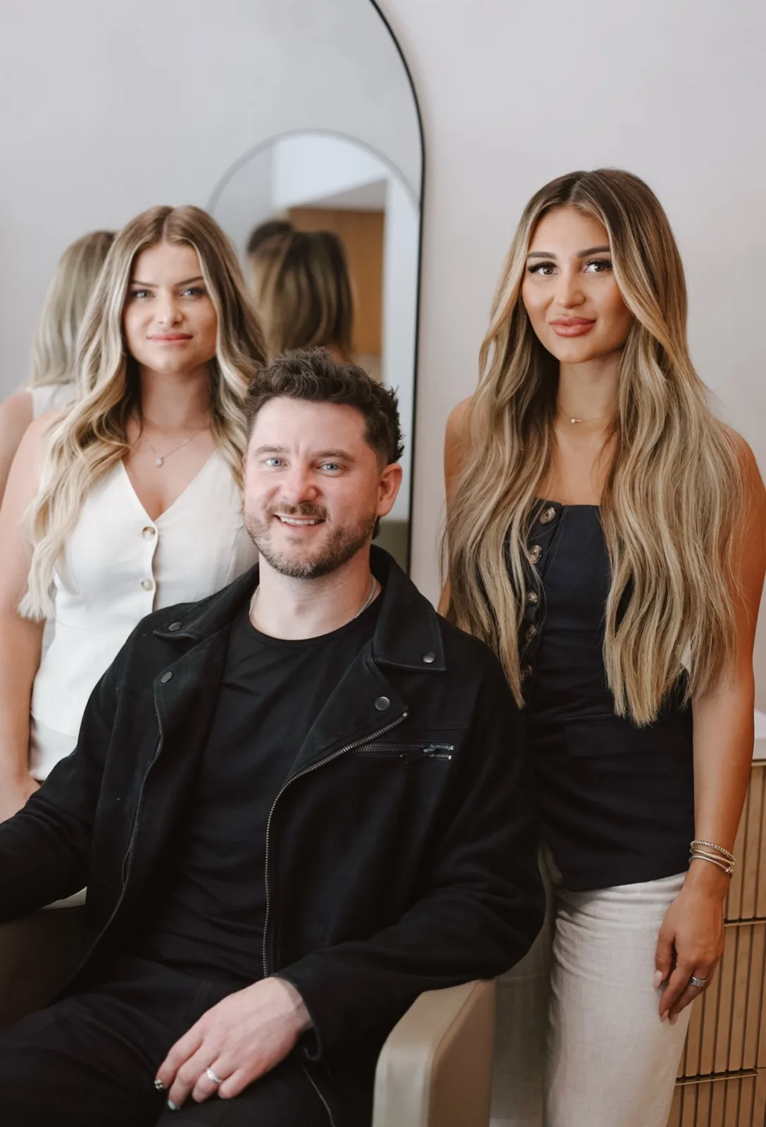 The Lux Lounge team — Colby Smith, Natalie Kerley, and Abbey Kreibich in the salon, Little Italy San Diego